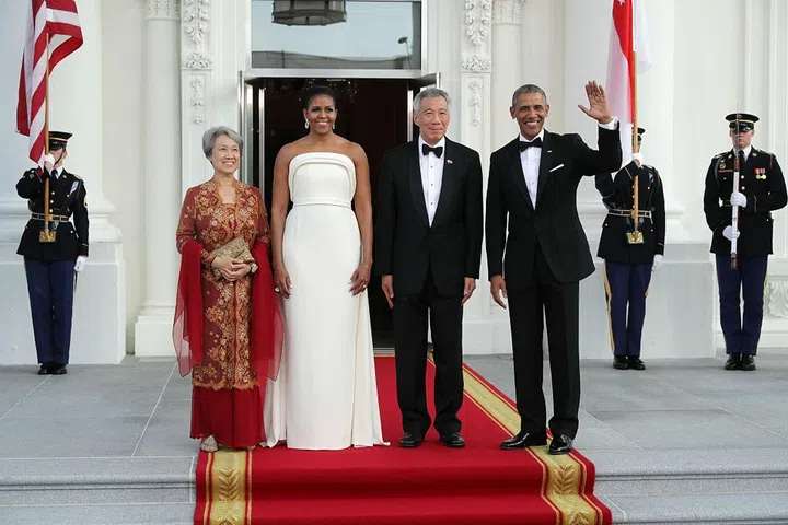 The Obamas pose with Singapore's Prime Minister Lee Hsien Loong and Ho Ching.