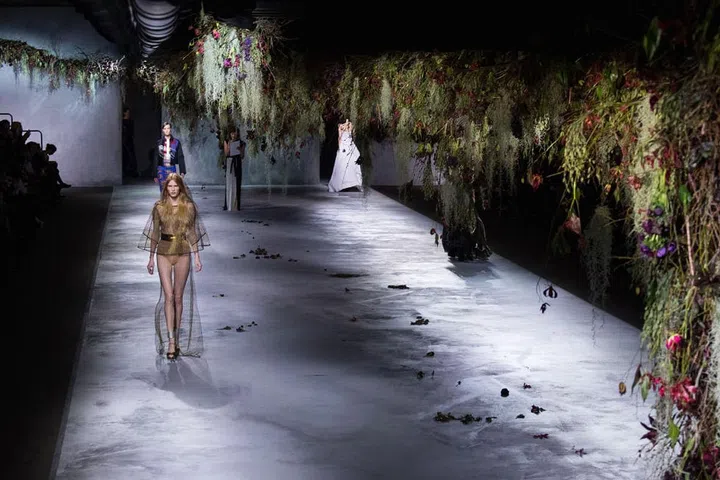 Who says florals have to be bright? Take a cue from this moody Vionnet runway and incorporate dark fall floral prints into your home design, adding accents of textured charcoal and deep blue hues for an air of mystery. 