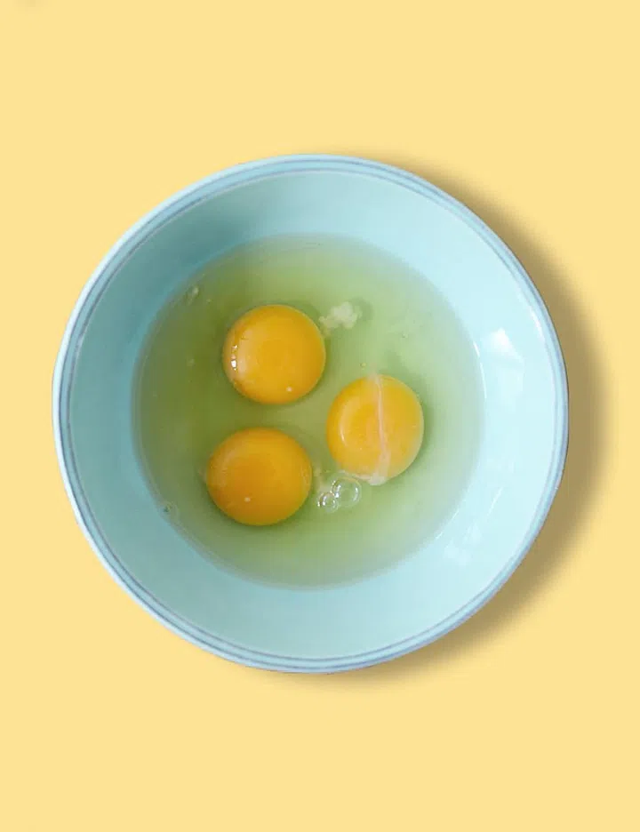 Applying raw egg whites to tighten your face
Photo: Getty
