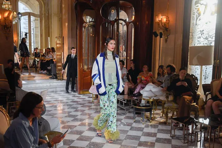 The model walks the runway in Paris.

Photo: Getty