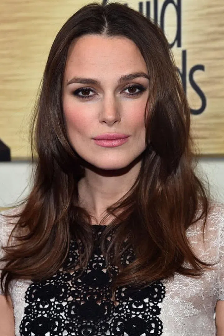 Another way to accent brown eyes is with a sexy black shadow or liner. Rim your upper and lower lashlines, then smudge the pencil gently. "It gives an intense subtle smoky line," says Wilson. Black adds a dramatic effect to colorful looks as well. "I use a black pencil underneath the blue or purple colors to intensify them," suggests Wilson. If you choose a waterproof option, "it lasts all night without budging." Photo: Getty 