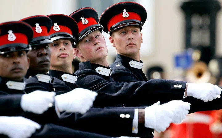 Prince Harry marches with fellow army cadets at Sandhurst Royal Military Academy in Sandhurst, England.