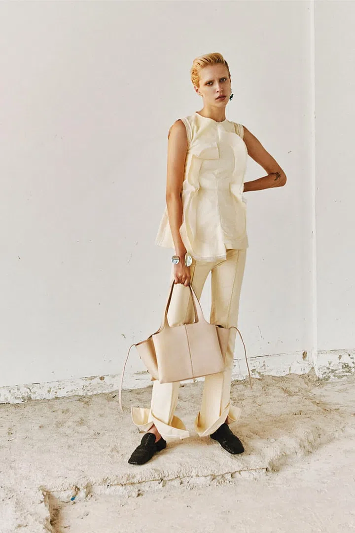 Cotton Moleskine Top; Viscose Double Sable pants; Powder Grained Calfskin Tri-Fold bag; Silver Petal cuff; Kidskin Woven moccasin, Céline 