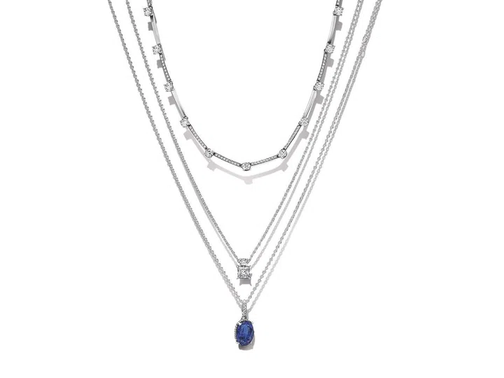 From top: Sterling silver Sparkling Pavé Collier Bars necklace, $279; Sparkling Collier Round & Square pendant necklace, $149; Sparkling Statement
Halo pendant necklace with a princess blue crystal, $159. (Photos: PANDORA)