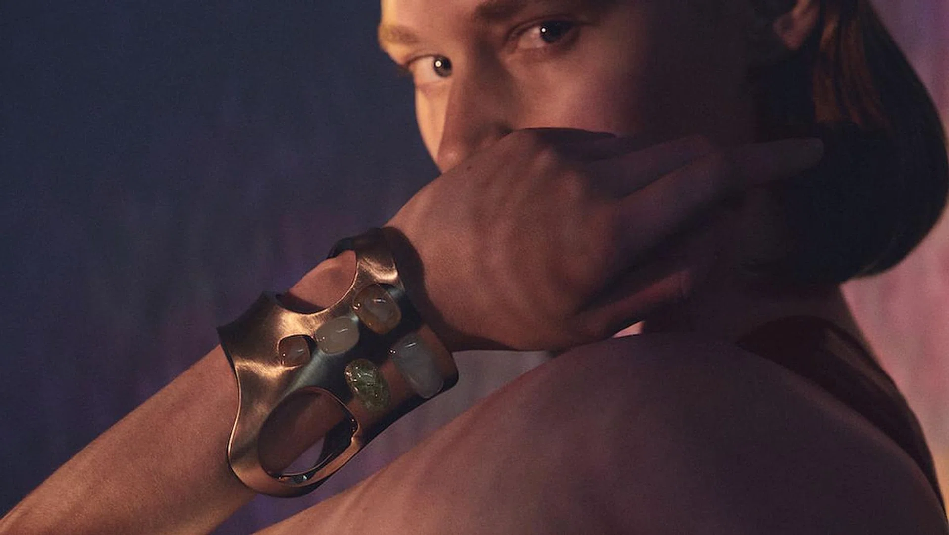 The satin-brushed rose gold Hermès Faire Corps cuff with rutilated quartz, quartz and moonstone cabochons. (Photo: Hermes)