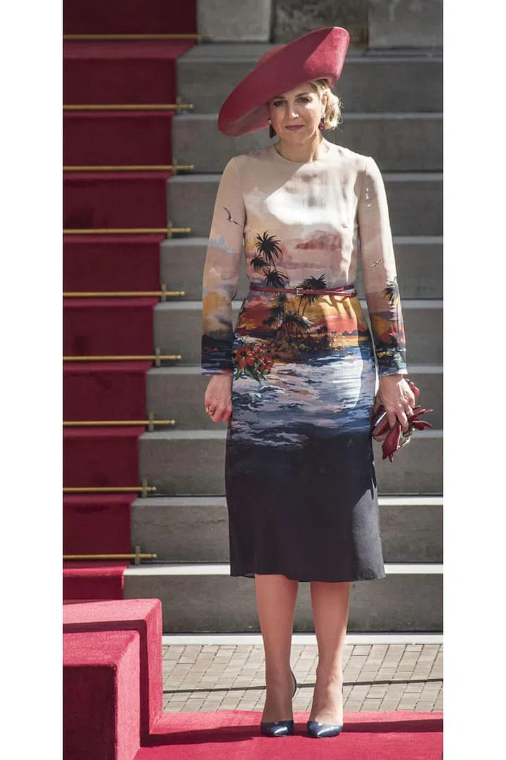 She's unafraid to take risks, such as this tropical-print shift dress.