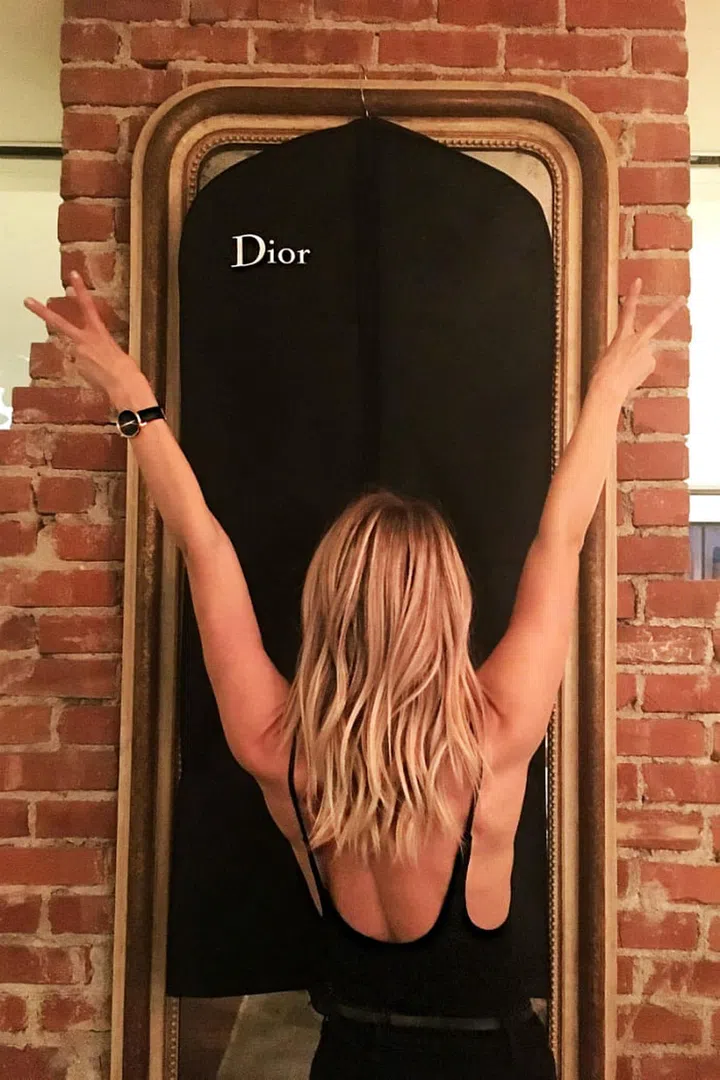 For the Dior party, Hough wore—what else?—a Christian Dior dress from the spring 2017 collection. 
