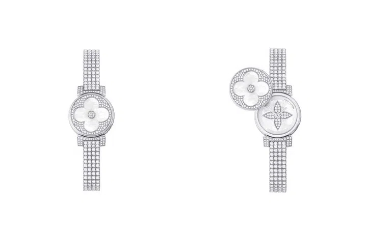 Louis Vuitton is closely associated with the glamorous aspects of travel, and the Tambour Bijou Secret watch can take you just about anywhere. Based on the flowers of the L.V. monogram luggage canvas, a monogram flower charm made of diamonds and mother-of-pearl swings open to reveal a hidden timepiece featuring a second pointed diamond flower dial on a fully diamond-paved bracelet. 
Price Upon Request. louisvuitton.com