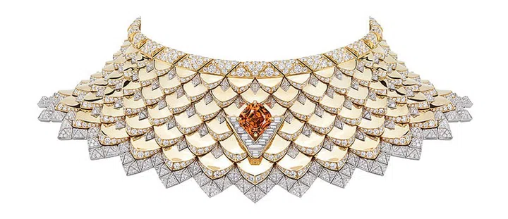 Gold, platinum, Mandarin spessartite garnet and diamond Radiance necklace, Louis Vuitton.