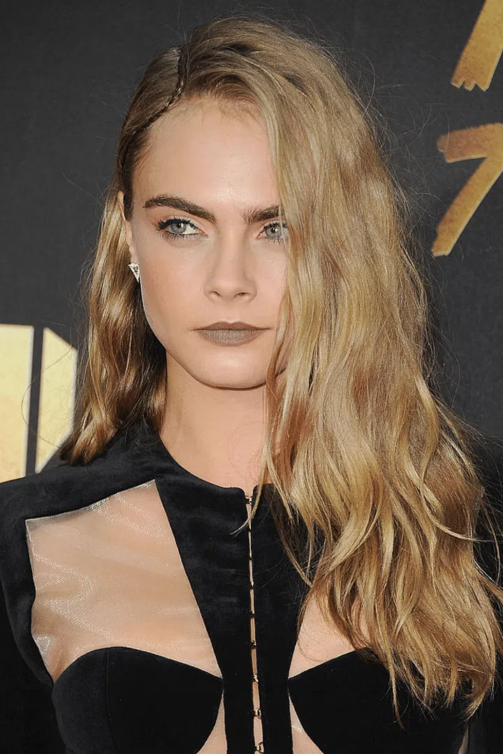 Matte skin and taupe lips for the ultimate cool girl look.