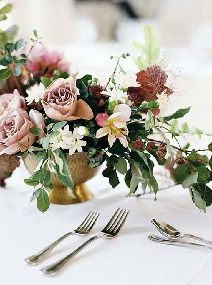 Wondering if roses come in the perfect shade of "dusty rose"? Of course! Photo: Polkadot Bride