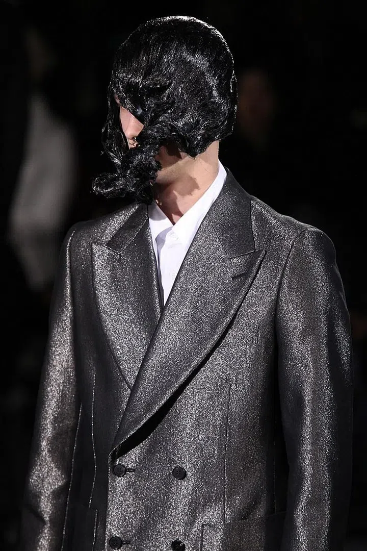 Said to be inspired by David Lynch's 1980 film, The Elephant Man as well as the Hindu elephant god Ganesh and even gas masks, hairdresser Julien dYs – who has been working with the house for a decade – created this oiled masterpiece on the models' hair. We could see Jared Leto recreating this look on 1 May. Photo: Getty