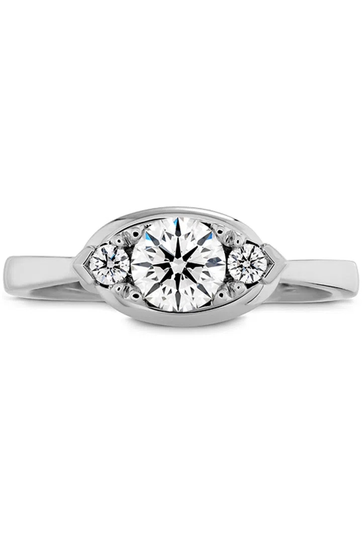 Your ring has: An ornate, multi-diamond style

You are: One-of-a-kind. "You have an appreciation for unique items and one-offs," Sabatino says. "And you don't mind a little work or digging, because 'the find' is totally worth it." A die-hard vintage lover, you like your possessions—and your people—a little eccentric and unconventional.

Hearts on Fire Optima Regal Engagement Ring, heartsonfire.com.

Photo: COURTESY OF HEARTS ON FIRE