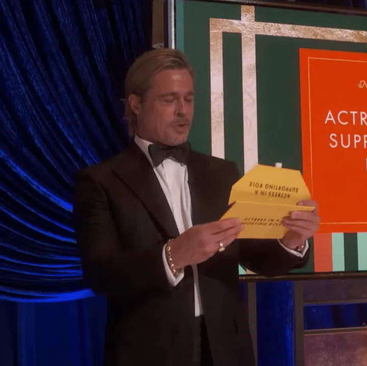 Brad Pitt Brought His Tiny Ponytail To The Oscars
