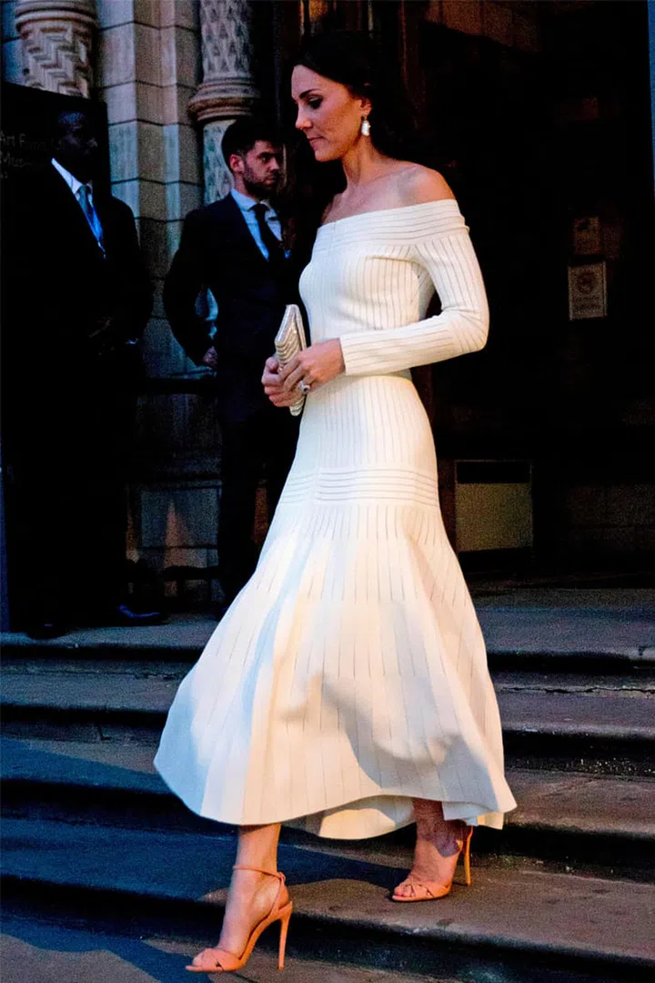 While she'll never navigate far from the dress code, that doesn't mean the Duchess' wardrobe is either boring or predictable. Willing to take risks at the right moments – like in this off-the-shoulder Barbara Casasola dress  – she's also a great supporter of young British designers.