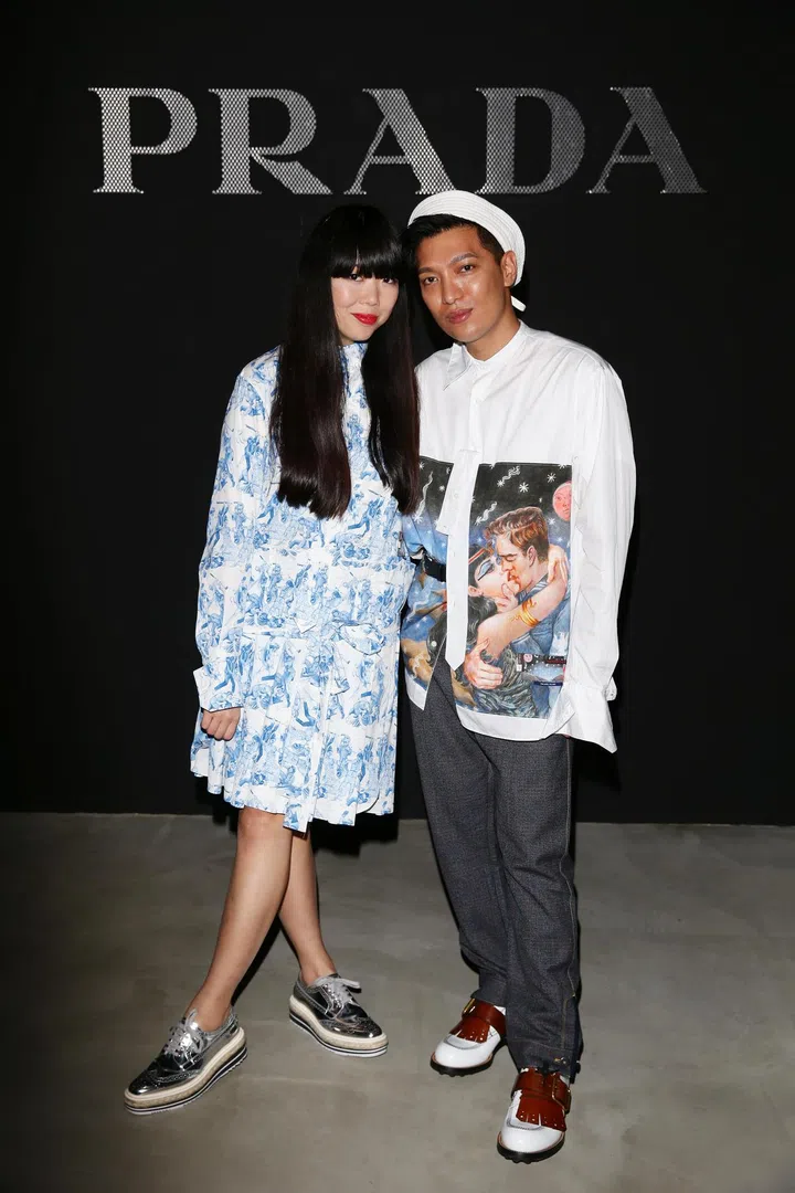 MILAN, ITALY - JUNE 19:  Susie Lau and Bryan Boy attend the Prada show during Milan Men's Fashion Week SS17 on June 19, 2016 in Milan, Italy.  (Photo by Vittorio Zunino Celotto/Getty Images for Prada)
