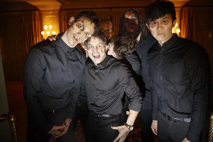 Servers were clad in all black and special effects makeup as an homage to the couple's love for horror films. Photo: Lara Porzak