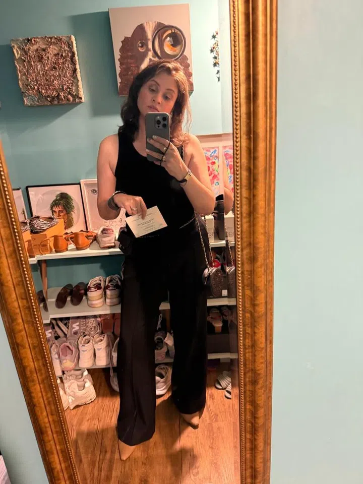 Renee’s outfit check before leaving for the after party.
