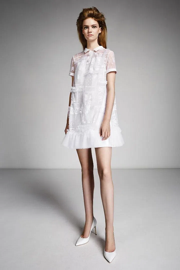 Looking to mix things up a little? A shorter frock makes for some playfulness at your wedding reception, whether it be a ruffly mini or a toned down midi-length dress, such as in Elie Saab, Viktor & Rolf, and Vera Wang, effectively showing off your legs and heels.
