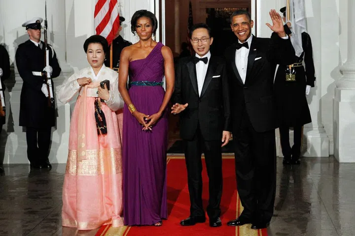 The Obamas pose with South Korean President Lee Myung-bakand the Republic of Korea's First Lady Kim Yoon-ok.