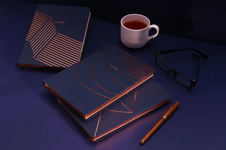 What better way to set goals for the new year than with a snazzy 2020 diary? Colins Debden's 2020 collection features diaries that come in glitzy copper accents and bright rainbow hues. We especially like their Vanguard collection that puts a contemporary spin on a typical diary. It includes an expandable inner pocket for any loose storage, in three different A5 designs. 