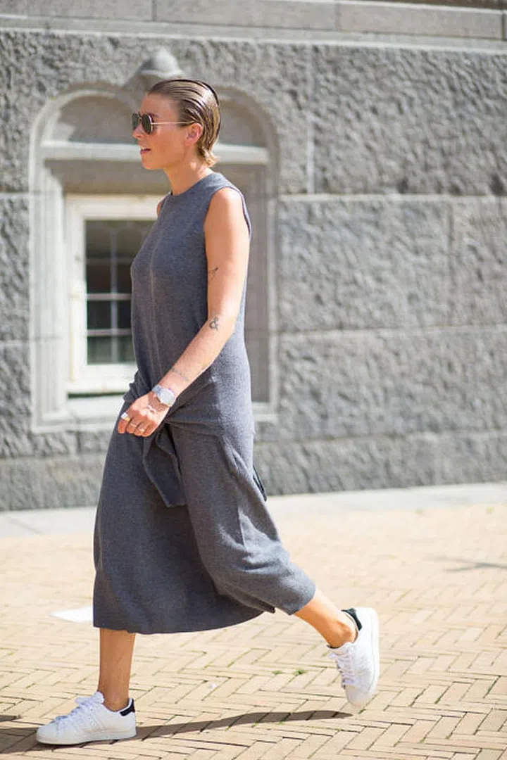 You can never go wrong with the simplicity of a sheath midi dress and all-white trainers.Photo: Diego Zuko 