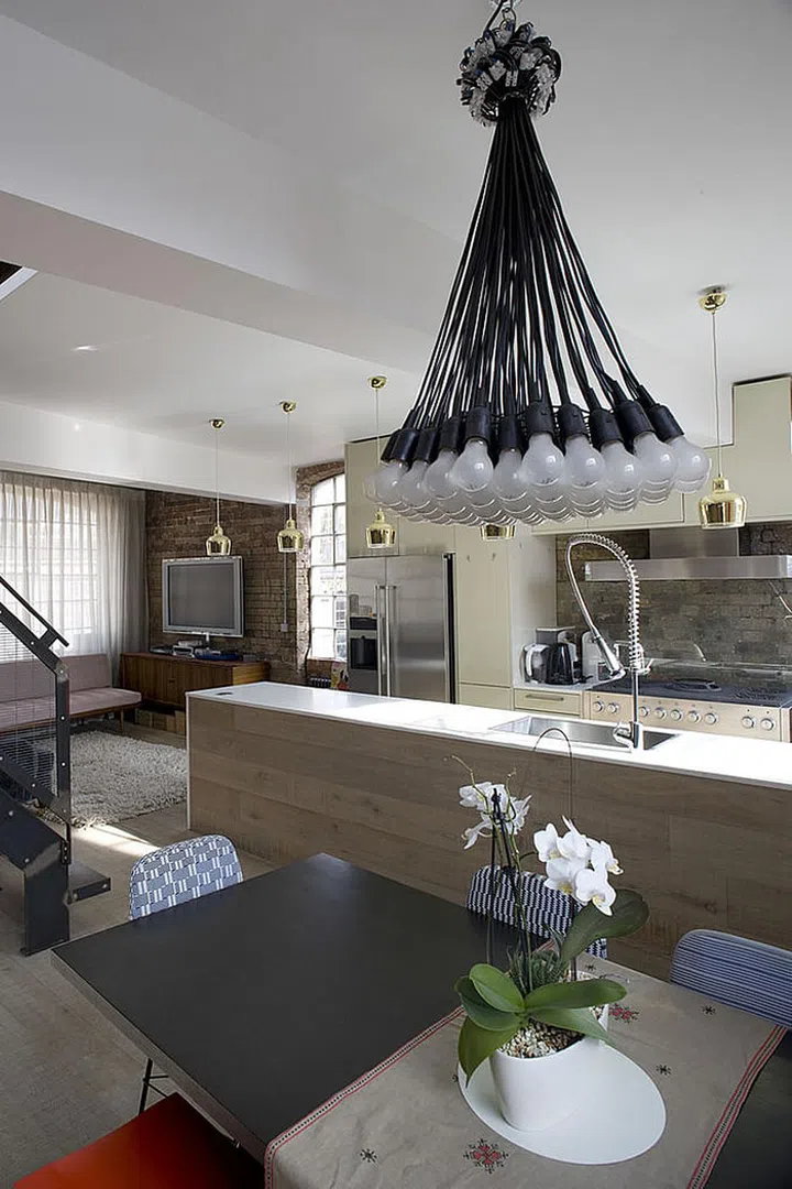 A "cerused" finish refers to the technique that brings out the unique grain of wood. "This trend which has been around in the high end market for some time has finally trickled down and seems universally accepted," says Laura Michaels. You'll see it on cabinets, but also in bigger pieces like tables, chairs, and storage furniture.