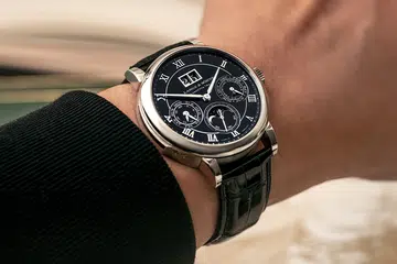 man wearing A Lange & Söhne minute repeater perpetual watch