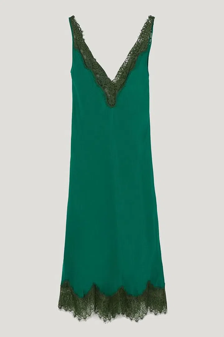 We're dreaming of wearing this silk emerald slip with nothing but a tan.