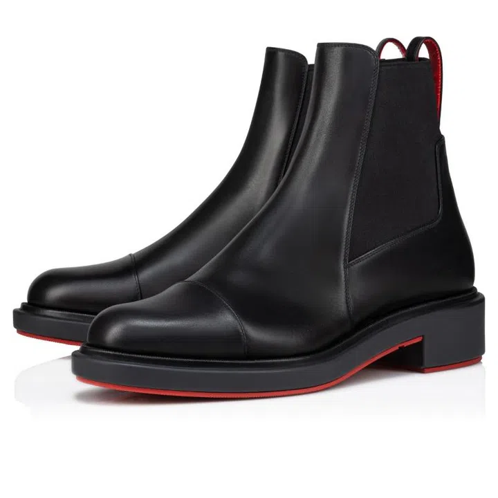 Party dress codes formal Christian Louboutin black leather boots