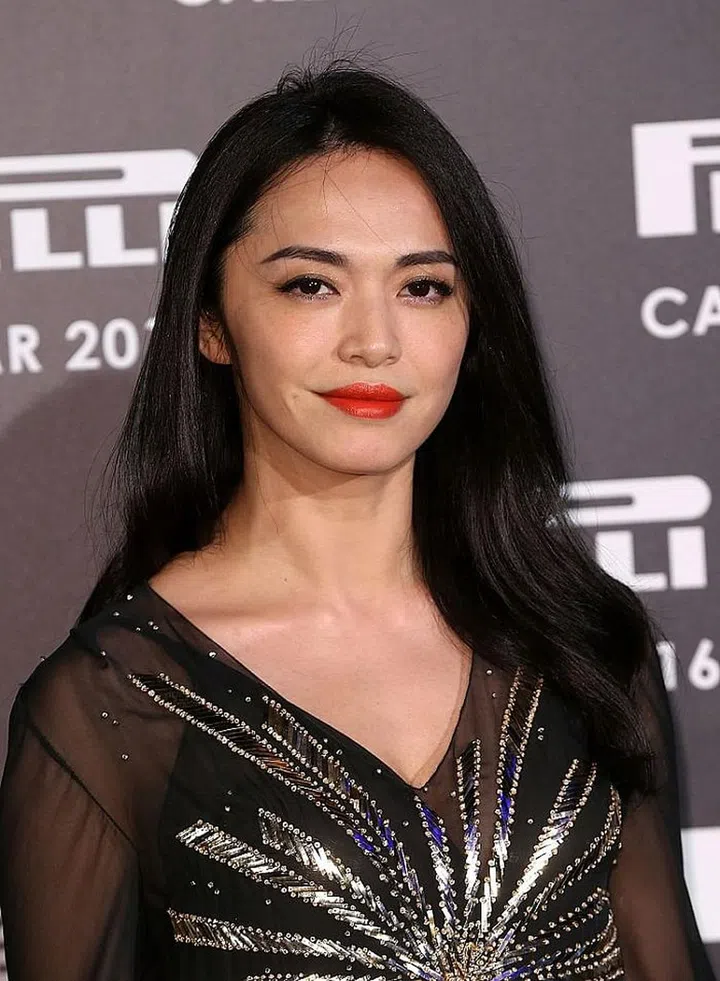 In the shower, add a hair mask step to hydrate dry ends. Then, apply a smoothing serum along the lengths of your hair before blow-drying your hair with your head tipped upside down for an airy effect. 

Photo: Getty Images