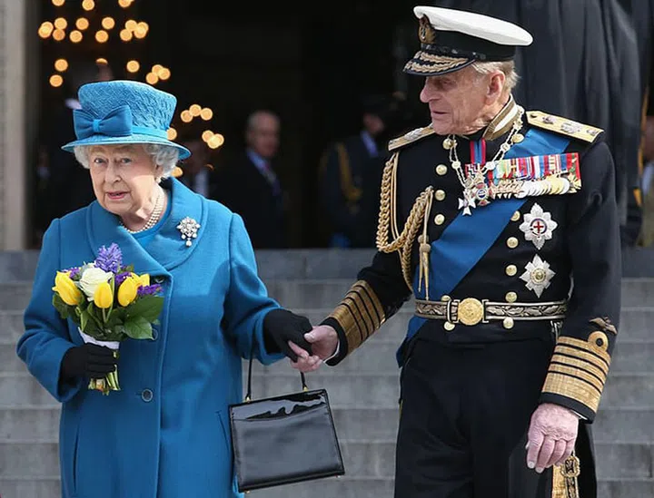Prince Philip and Queen Elizabeth II depart a service of commemoration for troops who were stationed in Afghanistan.