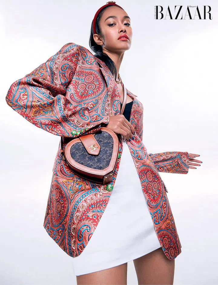 Bag, from CELINE. Blazer; skirt, both from Etro. Bra top, from Coach. Headband, from Roger Vivier. Necklace, from Kate Spade New York. (Photo: Phyllicia Wang)