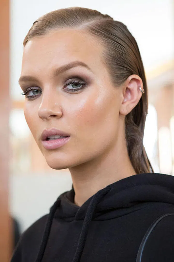 The cheekbones were a slick as the hair backstage at Balmain.