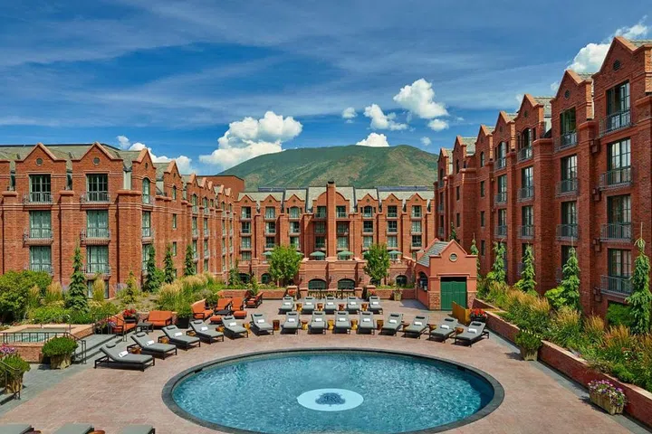 Guests at the St. Regis Aspen Resort can take a refreshing dip in the heated pool or one of three outdoor hot tubs while gazing up at Aspen Mountain. It's the ultimate après-ski indulgence—though just as lovely in other seasons, when the mountain is dappled with wildflowers or the aspen leaves are turning yellow.