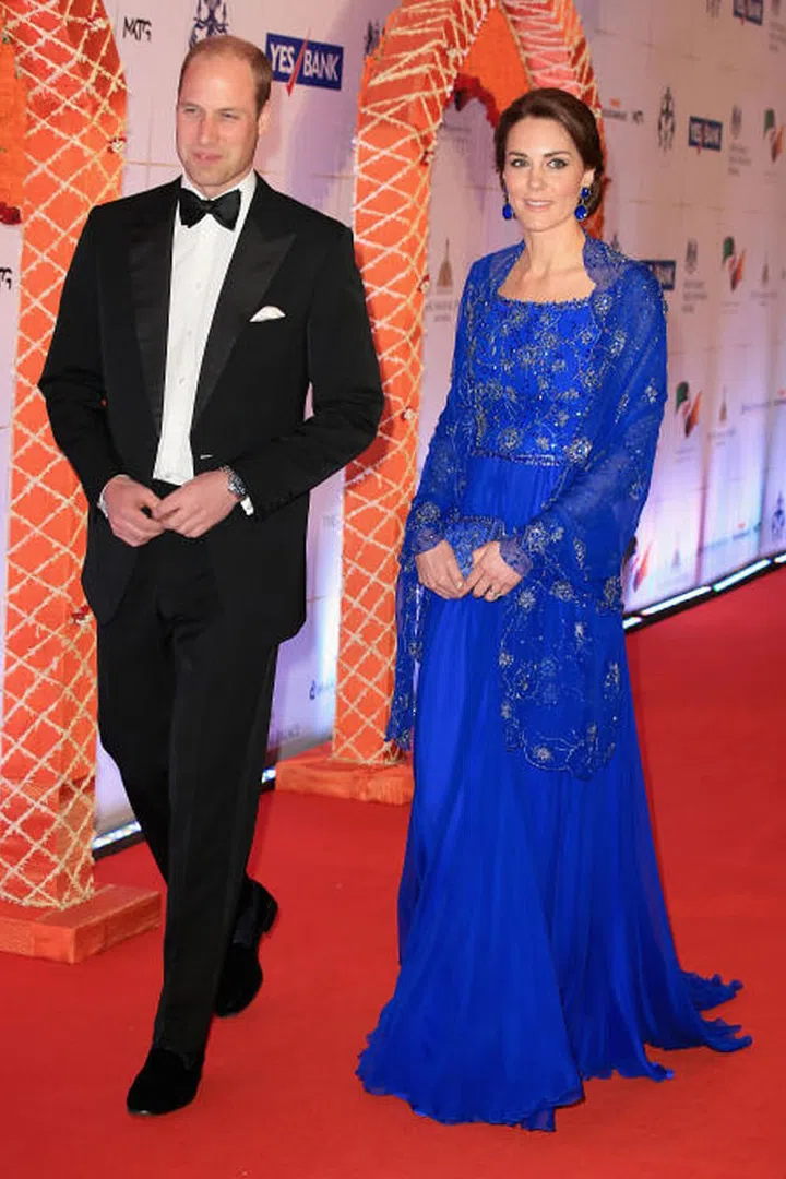 The Royal Couple rubbed elbows with Bollywood stars at a charity gala organized to raise funds for the organizations Kate and William met with earlier in the day. The Duchess of Cambridge's gown is by Jenny Packham with hand beading done in India. Photo: Getty