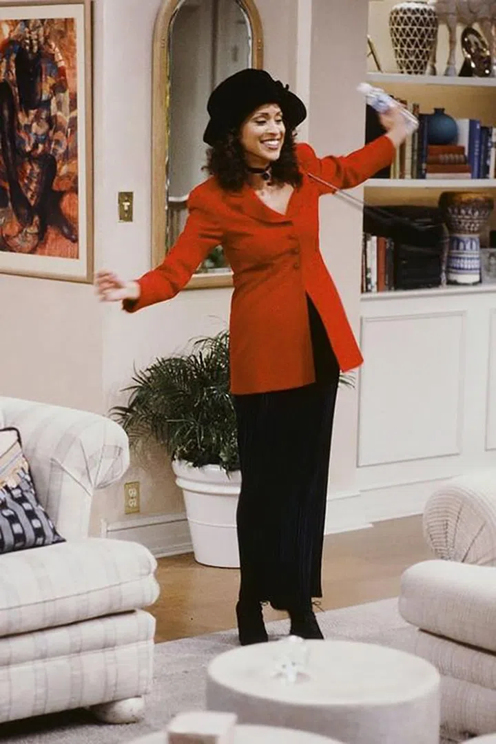 Though the Fresh Prince of Bel-Air may have boasted several well-dressed characters, Hilary Banks had the most fun fashion on the series. In her rise to a prominent weather reporter, her wardrobe transformed into suit separates and blossom hats topped off with the best jewelry.

Photo: Getty