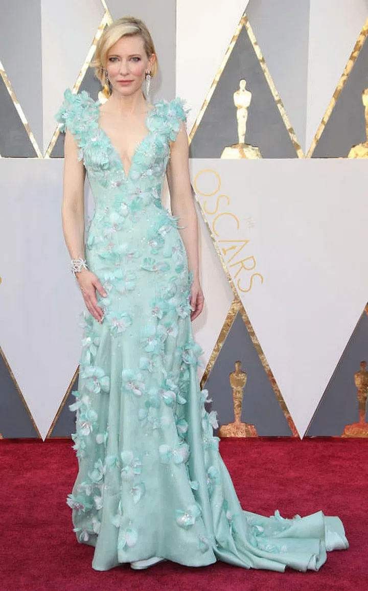 The actress, who was nominated for her role in Carol, looked like a dream in this aqua embellished floral Givenchy gown. Everything from the color to the styling made Blanchett's romantic red carpet look.
