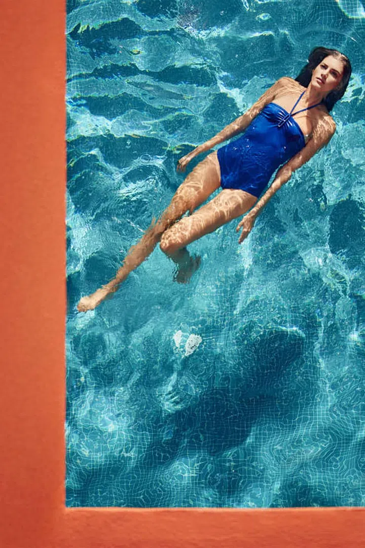 BEAUTY BAZAAR Shiseido Ultimate Sun Protection Lotion WetForce Broad Spectrum SPF 50+ works effectively on wet skin ($40).
Hermès swimsuit, $520, hermes.com.
Photo: Daniel Riera