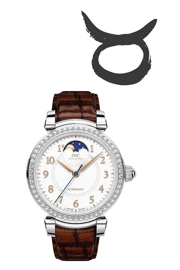 Down-to-earth Taurus knows the power of chic minimalism, and this 36 MM self-winding mechanical watch from IWC fits the bill. With a sturdy brown strap and an airy diamond bezel, the Da Vinci Diamond is both timeless (get it?) and fashion-forward. <b>IWC Da Vinci Diamond Automatic Moon Phase 36, $13,900</b>