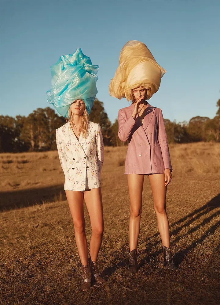 (Left) Linen jacket, Max Mara. 
Silk and lace bodysuit, Eres. Glitter and leather booties, Coach 1941. (Right) Linen jacket, Max Mara. 
Silk and lace bodysuit, Eres. Glitter and leather booties, Coach 1941