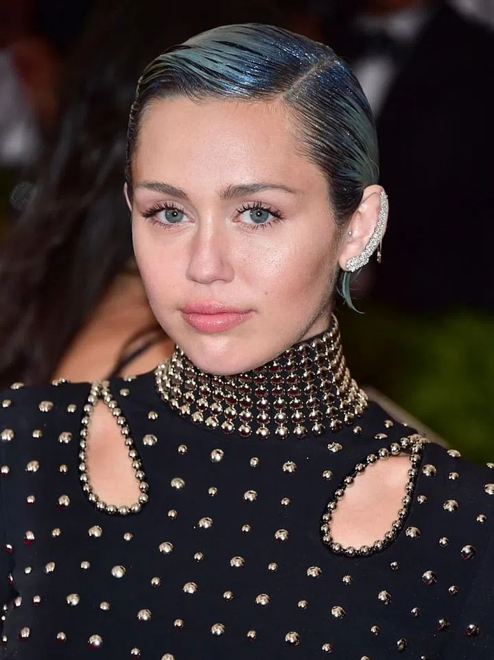 Miley has a million tricks up her sleeve. Her latest one? Gathering public attention before turning the conversation to her newest philanthropic effort—the Happy Hippie Foundation, a program she founded to help homeless and LGBT youth by providing digital support groups. She hosts "backyard sessions" AKA mini concerts with famous stars, with all sales supporting the cause. Go on, girl.
