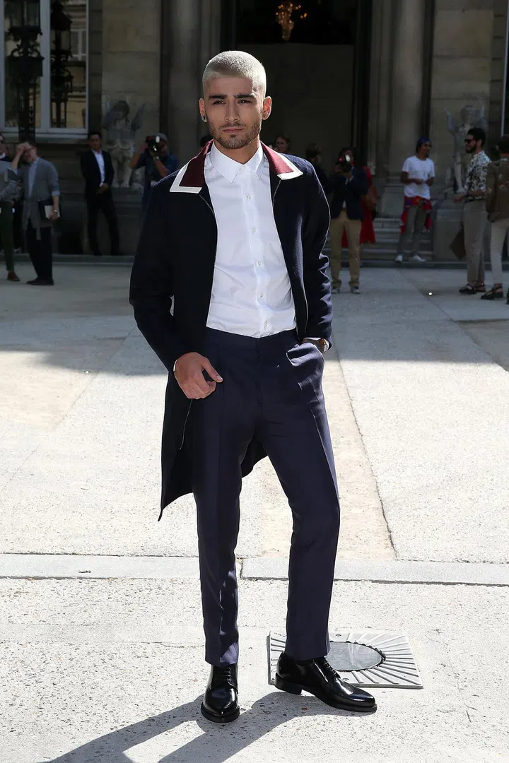 Malik's newfound style-icon status was cemented by appearances at the Louis Vuitton and Valentino shows. After all, he is a great advertisement for both brands.