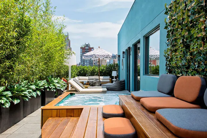 A super cool suite like Dream Downtown's new GuestHouse presidential suite—which includes a 900-square-foot garden terrace, a glass-bottom Jacuzzi, a Champagne Bar vanity, a private barista and a personal security guard—means you're practically required to throw a party. The Vibes Curator, on offer to guests in the $5000 per night suite, has a litany of duties, including arranging art installations in partnership with the Morrison Hotel Gallery, customizing bedding and pillows, building bespoke music playlists, personalizing the in-room coffee program, coordinating consultations with in-house salon IGK, setting up personal fittings with stylists and tapping into a network of DJs and mixologists worthy of the downtown NYC scene.