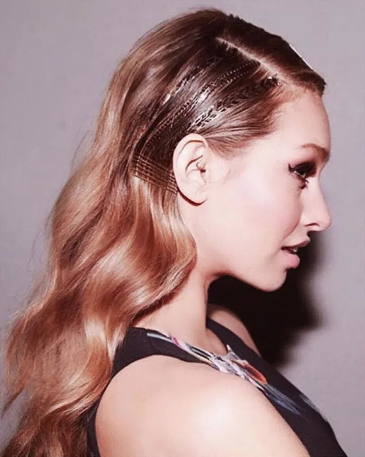 Elevate your slicked-back styles with metallic geometric designs you just have to peel off and stick on stick 'em on. We love the one-sided approach on this side-parted 'do, which was also created by Marjan.