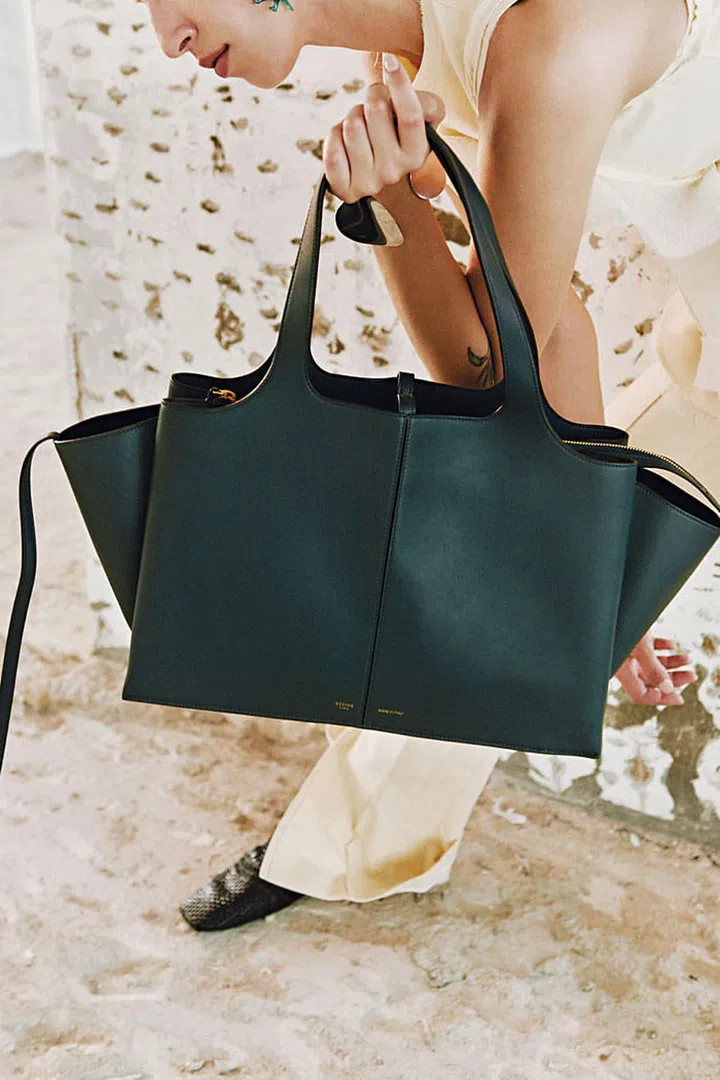 Cotton Moleskine top; Viscose Double Sable pants; Dark Green Medium Natural Calfskin Tri-Fold 
bag; Silver Petal cuff; Kidskin Woven moccasin, Céline 