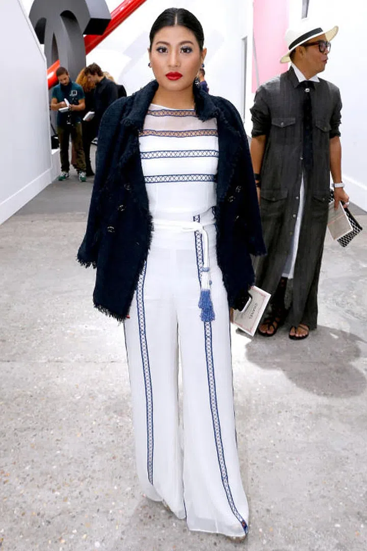 She's been spotted front row at couture shows, such as Chanel (pictured here) and Christian Dior, and is a devotee and supporter of Balmain.