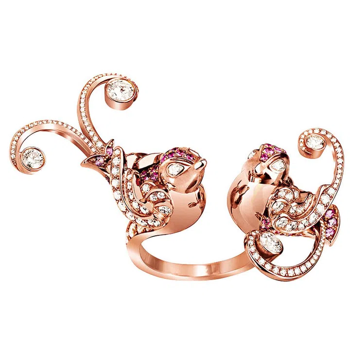 Van Cleef & Arpel’s Oiseaux de Paradis Between the Finger ring features two plump birds decorated with pink sapphires, and round and pear-shaped diamonds. A playful and youthful design that perfectly reflects how you view this big, big world with wide-eyed wonder.