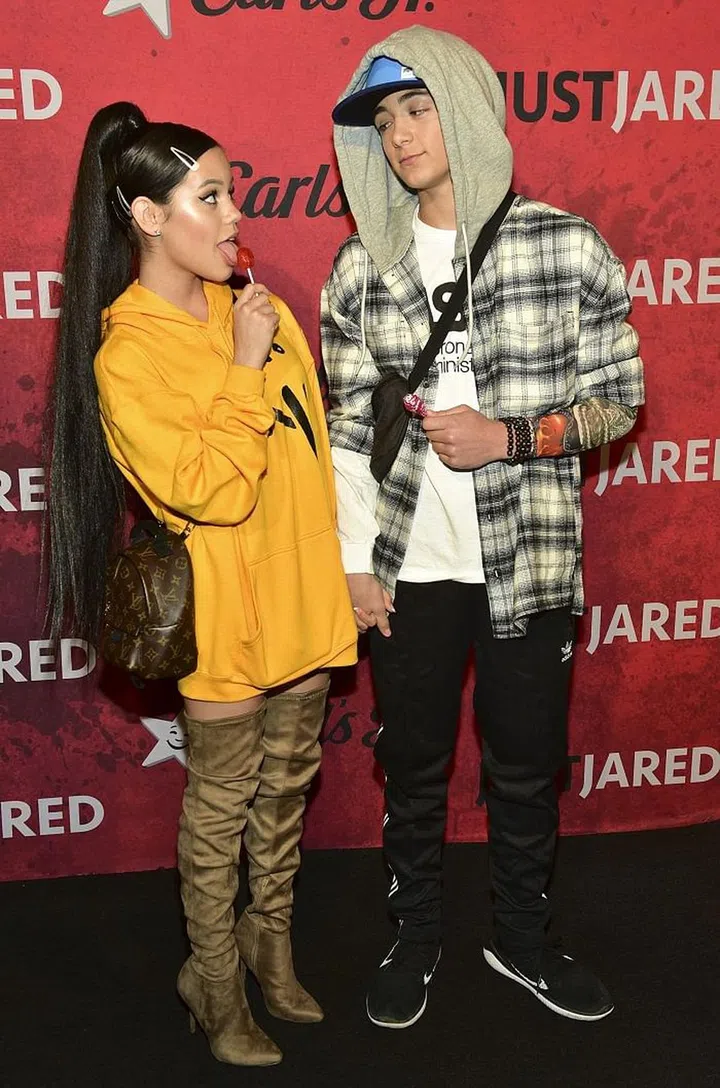 As Ariana Grande and Pete Davidson.
