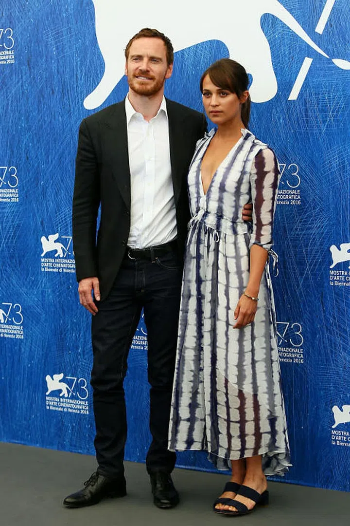 Michael Fassbender and Alicia Vikander in Prabal Gurung. Photo: Getty